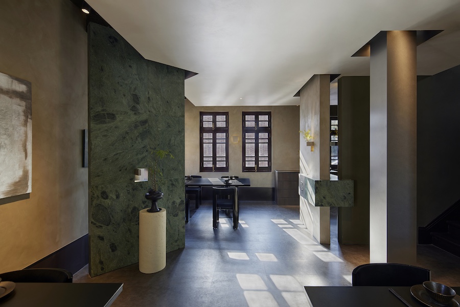 conglong hot pot restaurant nanjing china converted villa ambient lighting green marble wall dark wood finishes