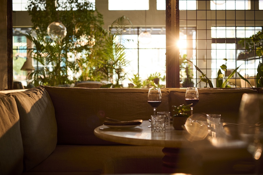 1 hotel melbourne from here by mike signature restaurant wine glass table banquette