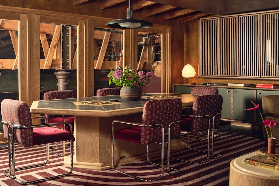 the malin flatiron communal shared workspace coworking office new york conference room burgundy chairs carpet millwork wall