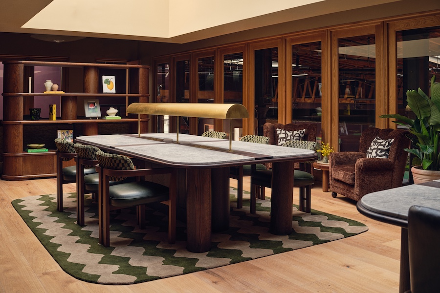 the malin flatiron communal shared workspace coworking office new york conference room green zigzag carpet skylight