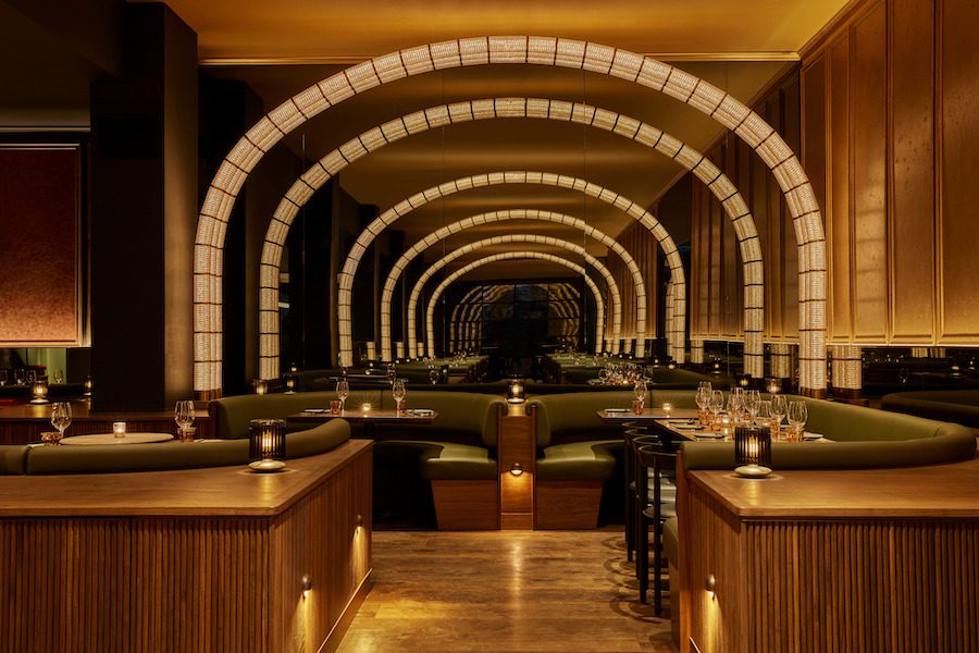 COQODAQ refined fried chicken flatiron new york korean and american style glowing bronze arches with green banquettes