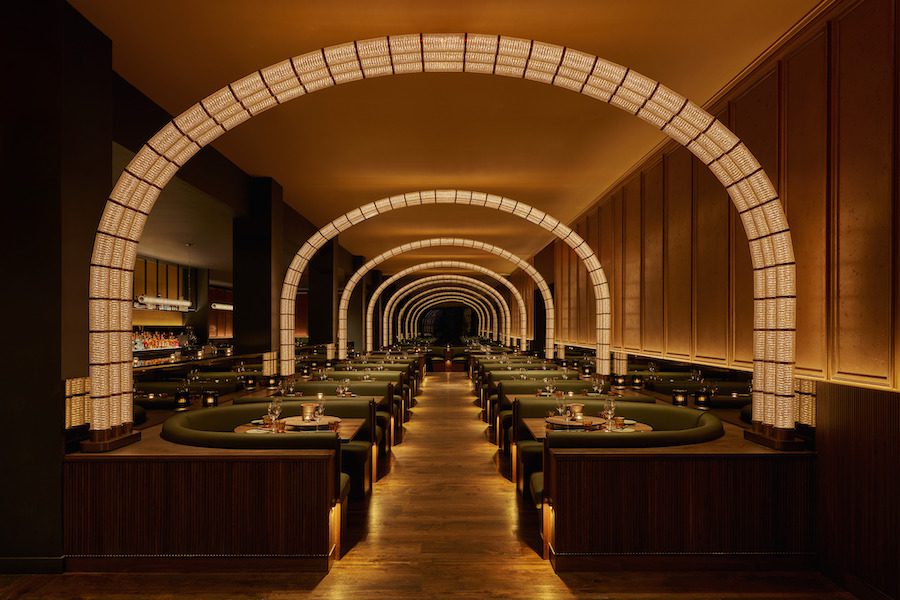 COQODAQ refined fried chicken flatiron new york korean and american style glowing bronze arches with green banquettes