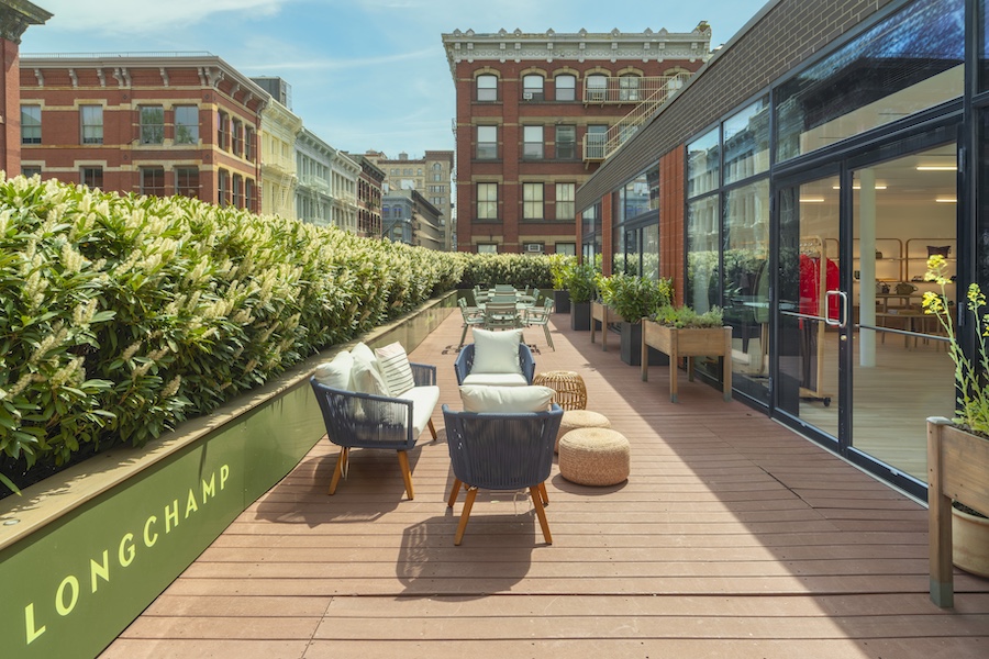 longchamp soho luxury retail store outdoor terrace seating area