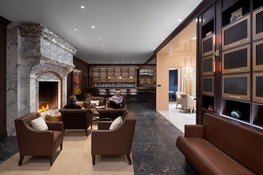 inspir embassy row washington dc senior living housing assisted living facility adaptive reuse library marble fireplace