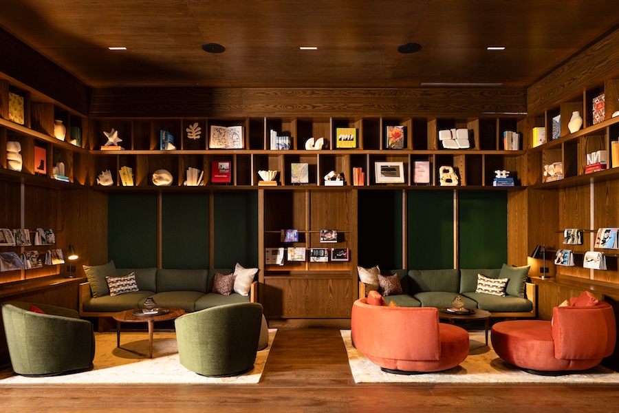 The Clara residences silicon valley california redwood den living room green panel walls couch built in shelves