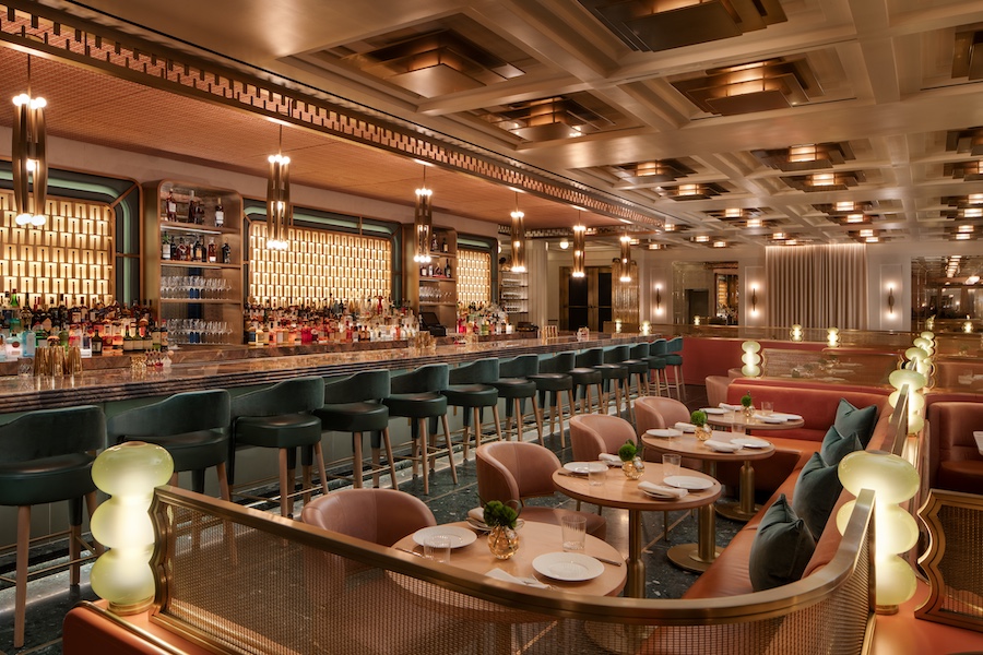 waldorf astoria new york lex yard coffered ceiling bar green stools orange banquettes light green art deco lamps