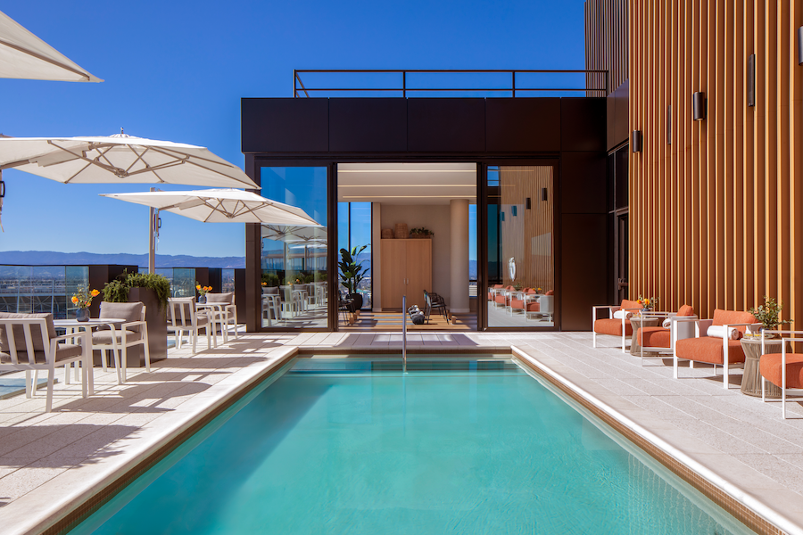 Ellore Santa Clara Library Pool Deck orange chairs sun umbrellas